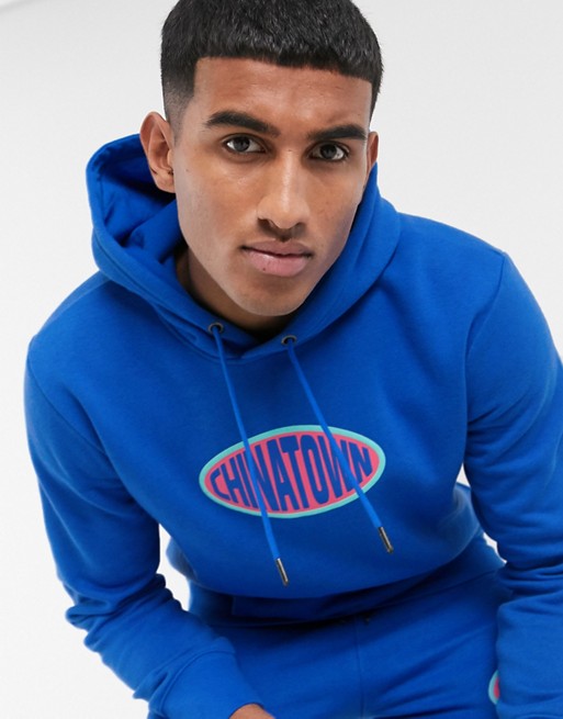 Chinatown Market Oval chest logo hoodie in blue