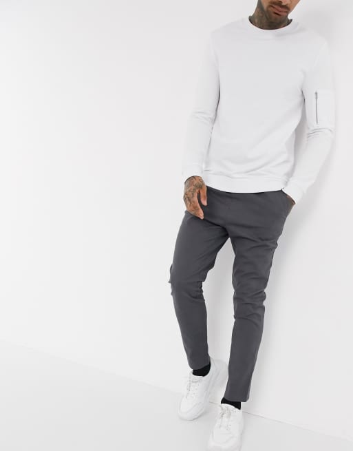 Chinos ajustados elásticos con cintura elástica en negro desgastado de ASOS DESIGN