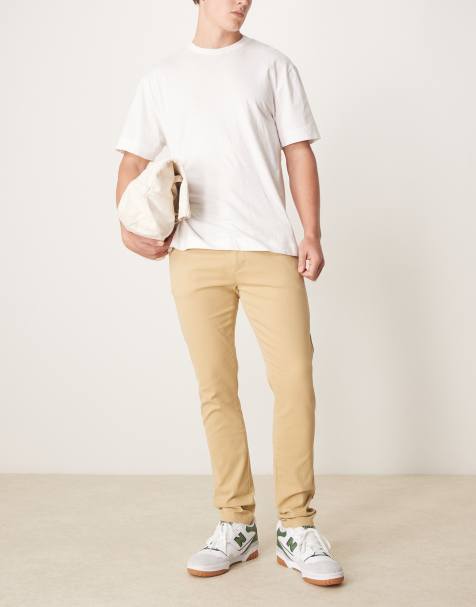 Chinos ajustados en beis de ASOS DESIGN - view 1