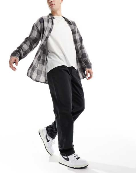 Chinos negros de corte recto con pinzas dobles de ASOS DESIGN - view 1