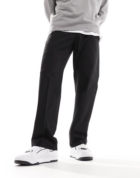 Pantalones holgados unisex de estilo carpintero con lavado oscuro