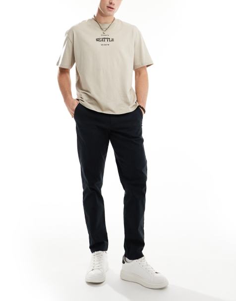 Chinos tapered en negro de ASOS DESIGN - view 1