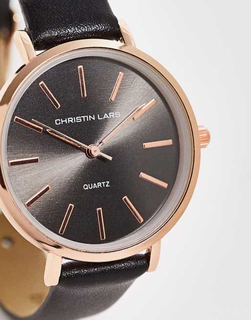 Christin Lars – Uhr in Gold mit schmalem Lederriemen in Schwarz