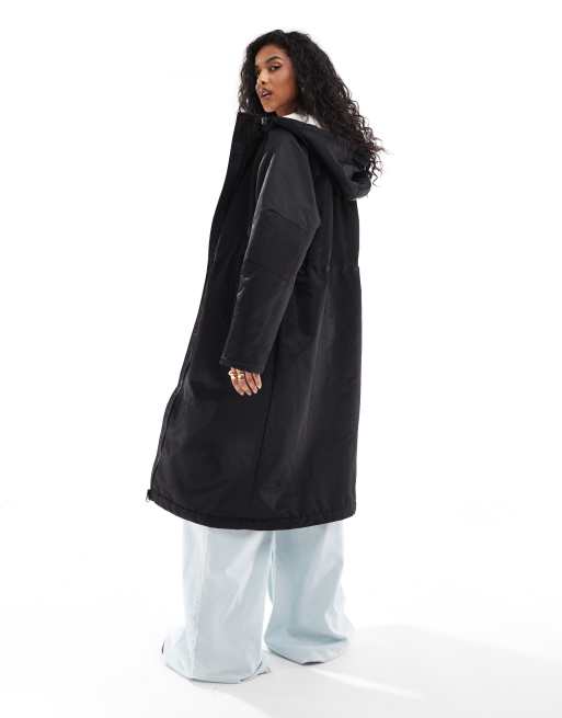 Chubasquero largo negro con forro de borreguito de ASOS DESIGN ASOS