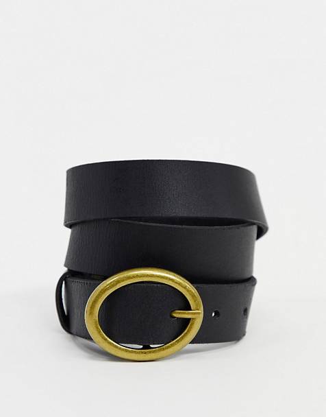 Cinturón de cuero con hebilla ovalada en negro de Topshop complemento fondo de armario selección de Palmera Magazine