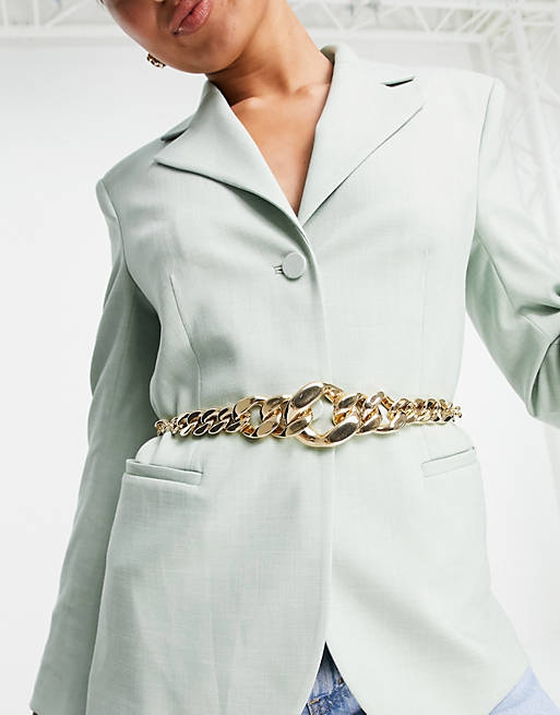 Mujer Cinturones | Cinturón dorado para cintura y cadera estilo cadena con diseño grueso en la parte delantera de ASOS DESIGN - FO44065