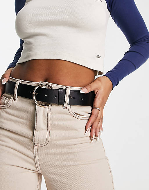 Mujer Cinturones | Cinturón negro con diseño para cadera y cintura y hebilla minimalista redonda dorada de Glamorous - XU91351