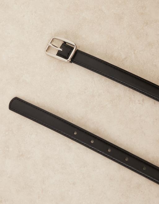Cinturón negro con hebilla plateada de Gina Tricot , 2 de 3