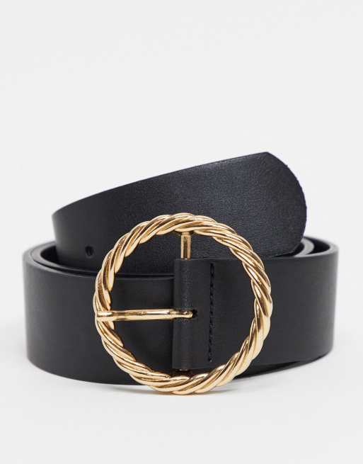 Cinturón negro para vaqueros para cintura y cadera con hebilla retorcida dorada de ASOS DESIGN