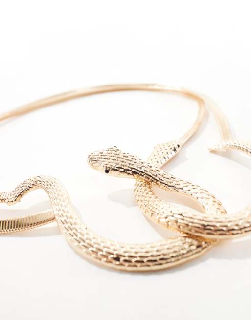Cinturón para cadera y cintura dorado con diseño de cadena de serpiente elástica de ASOS DESIGN Curve , 4 de 4