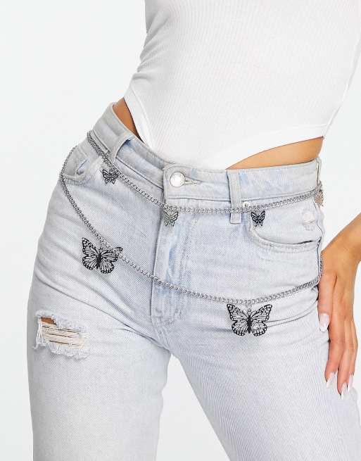 Cinturón plateado estilo cadena con diseño de mariposa de ASOS DESIGN