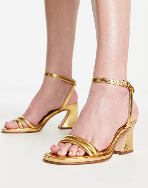 ASOS DESIGN Hitched bow detail mid block heeled sandals in gold