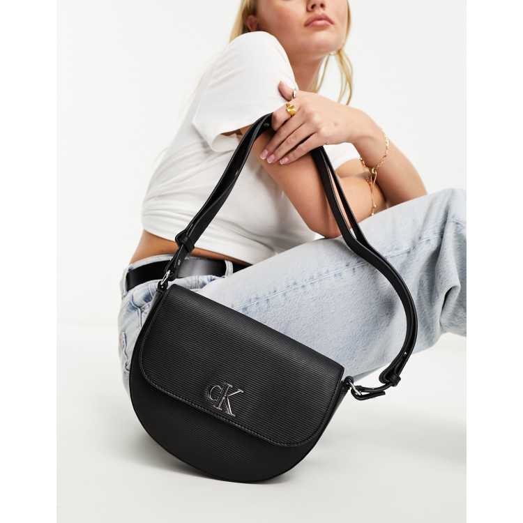 CK Jeans monogram saddle bag in black