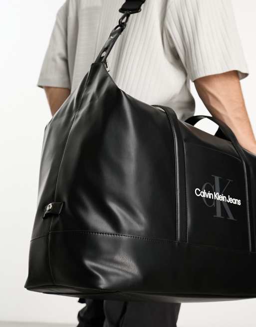 Calvin Klein Jeans MONOGRAM SOFT DUFFLE - Weekend bag - black