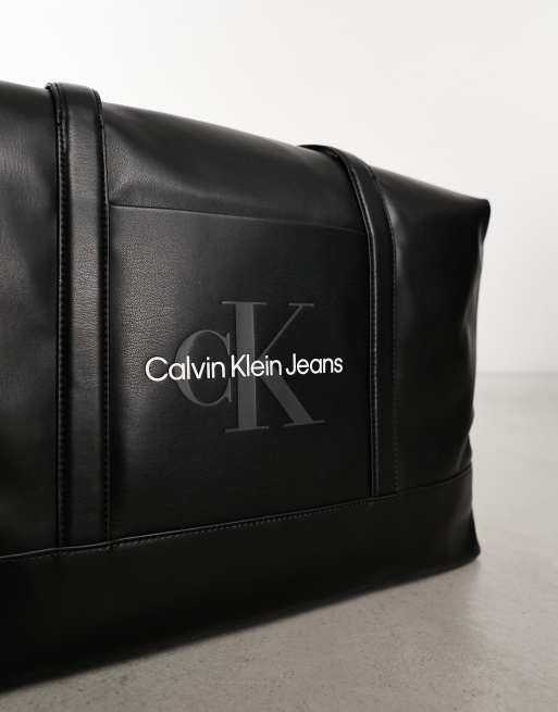 Calvin Klein Jeans MONOGRAM SOFT DUFFLE - Weekend bag - black