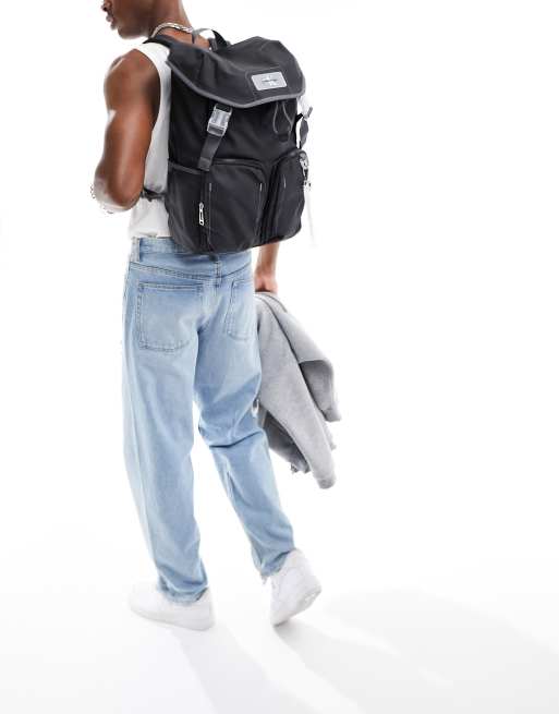 CK Jeans park culture flap backpack in black | ASOS