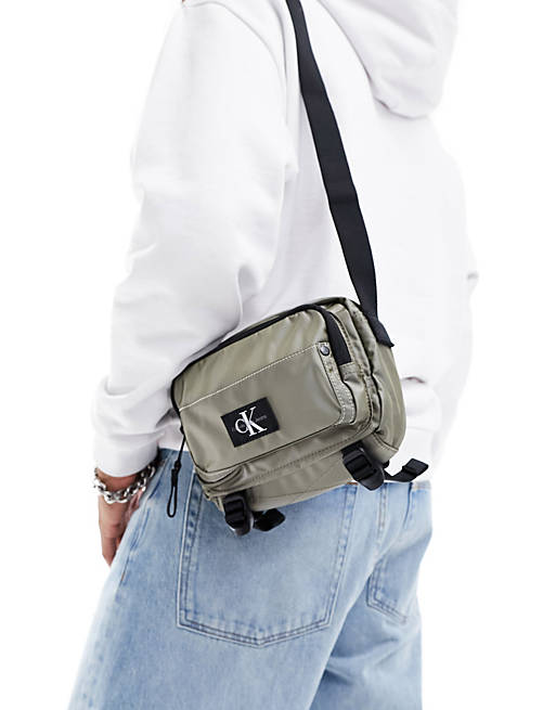 CK Jeans sport essentials camera cross body bag in black | ASOS
