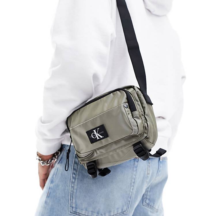 CK Jeans sport essentials camera cross body bag in black | ASOS