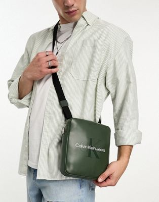 CK Jeans monogram soft reporter bag in green - ASOS Price Checker