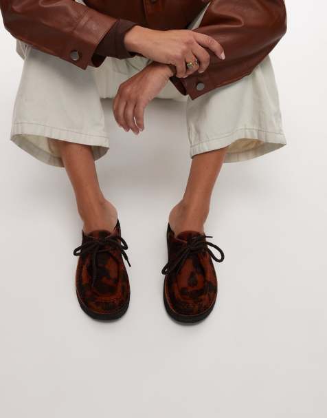 Clarks Originals Desert Nomad mules in brown cow print - view 1