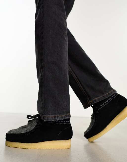 Clarks wallabee best sale run black