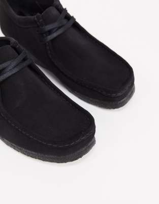 black suede wallabees