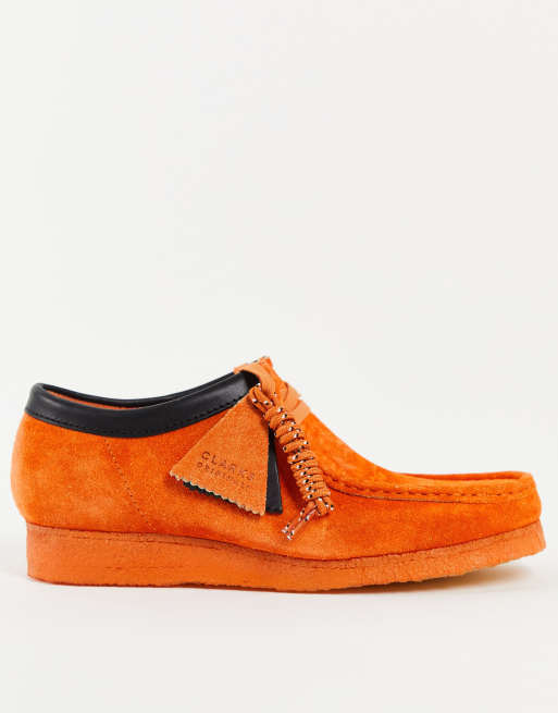 Orange wallabee clearance clarks