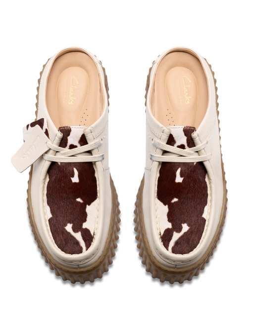 Clarks Torhill Mule in cow print suede | ASOS