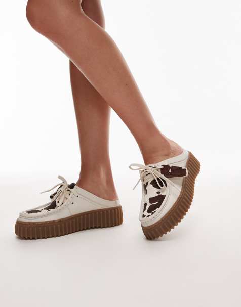 Clarks Torhill mules in cow print suede - view 1