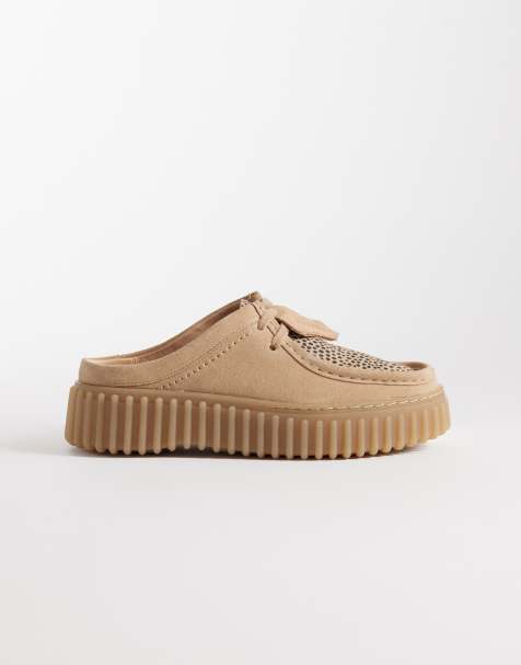 Clarks – Torhill – Mules mit Tierfellmuster - view 1