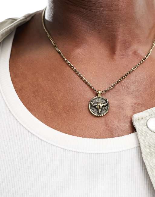 Classics 77 - Collana color oro con pendente a forma di moneta con testa di ariete