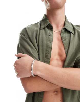 Classics 77 - Mountainous - Brede armband met bladeren in zilver