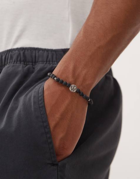Classics 77 – Perlenarmband in Schwarz mit Münzperle mit Palmenmotiv - view 1