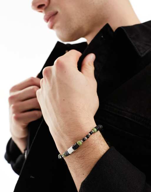 Classics 77 - Sort hulu-armbånd med perler og palmemotiv