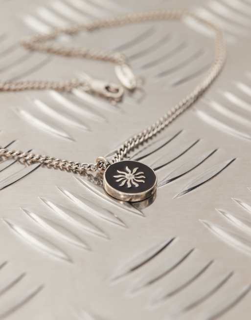 Classics 77 sun engraved pendant necklace in black and silver tone