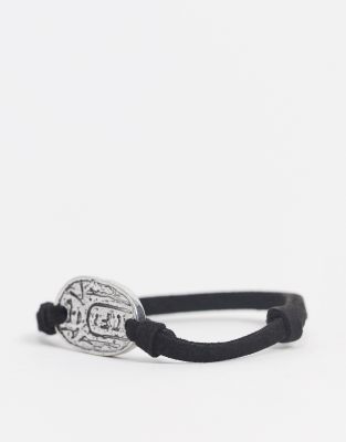 Classics 77 - Zwarte armband van imitatiesuède met gouden bedeltjes