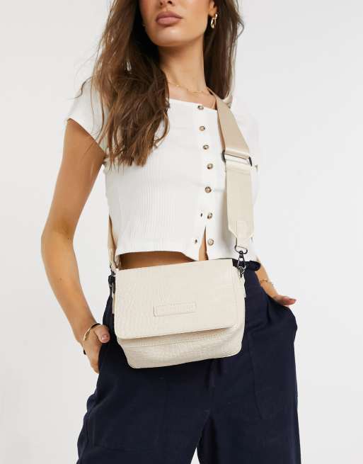Claudia Canova cross body bag with webbing strap in light cream croc ASOS