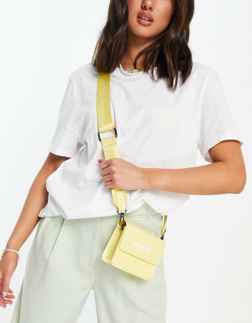 Claudia Canova logo flap shoulder strap bag in yellow