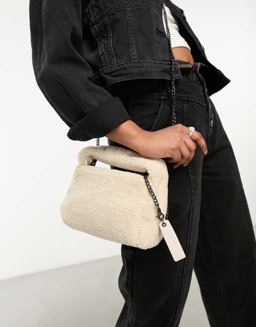 Claudia Canova mini grab bag with cross body strap in beige faux fur | ASOS