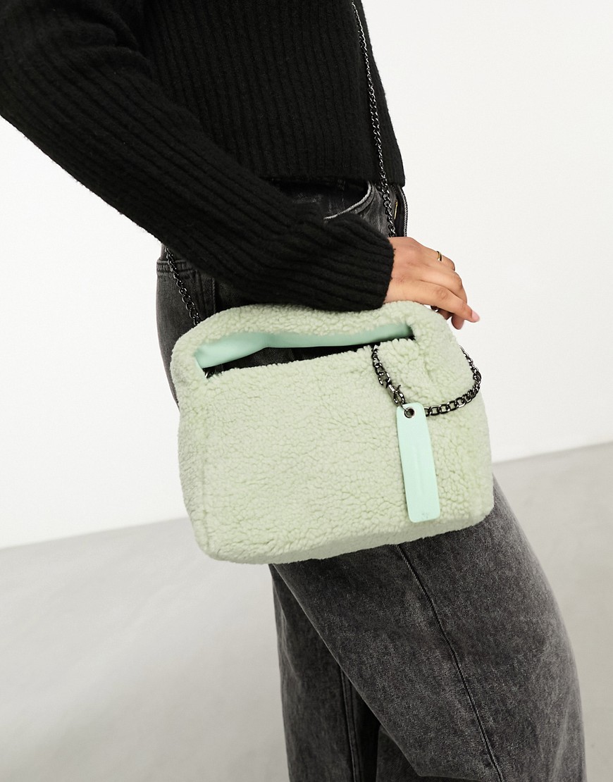 mini grab bag with cross body strap in mint faux fur-Green