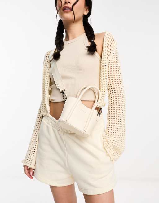 Claudia Canova - Mini handtas met crossbody band in wit