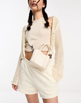 Claudia Canova soft mini grab bag with cross body strap in white