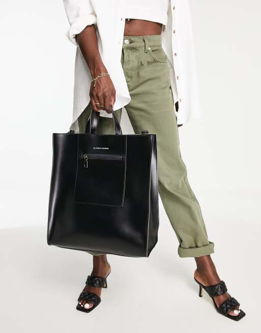 Claudia Canova – Svart boxig toteväska med handtag upptill