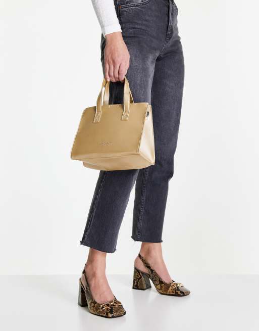 Claudia Canova top handle shoulder strap tote bag with insert pouch in gold