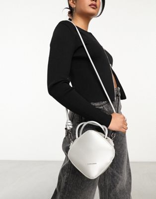 Claudia Canova triangle cross body bag in silver - ASOS Price Checker