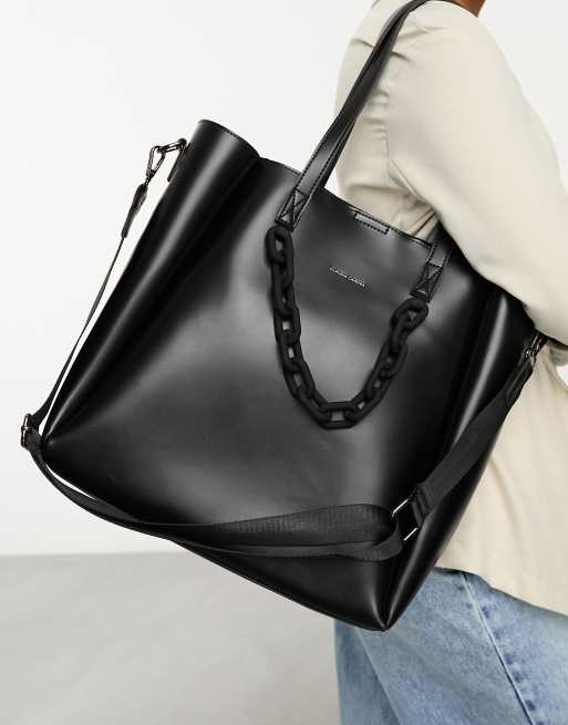 Black winged chain handle tote bag sale