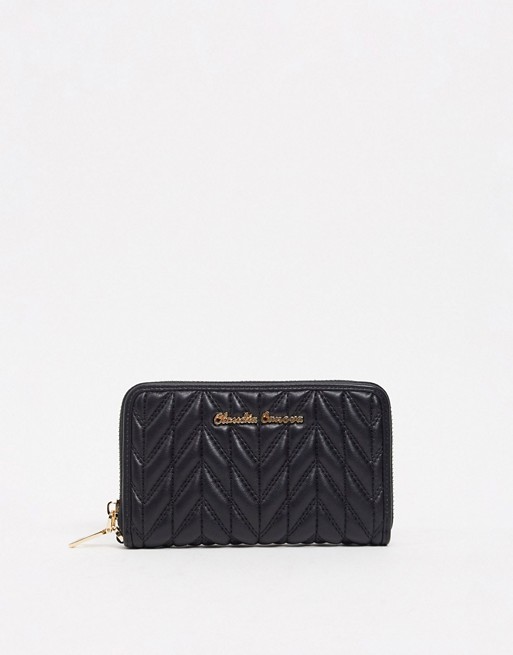 Claudia Canova zip around quilted purse in black