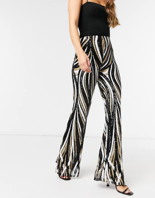 Club L London sequin flared trousers in black and gold