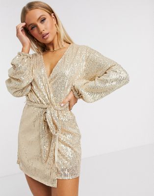 Club L sequin long sleeve wrap mini dress in gold | ASOS