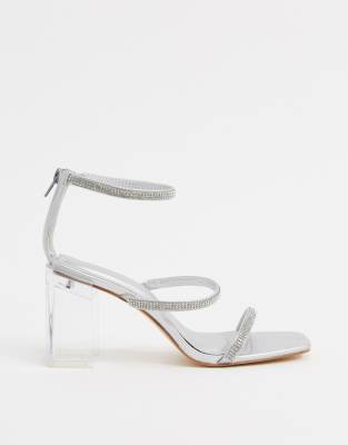 silver and clear block heels